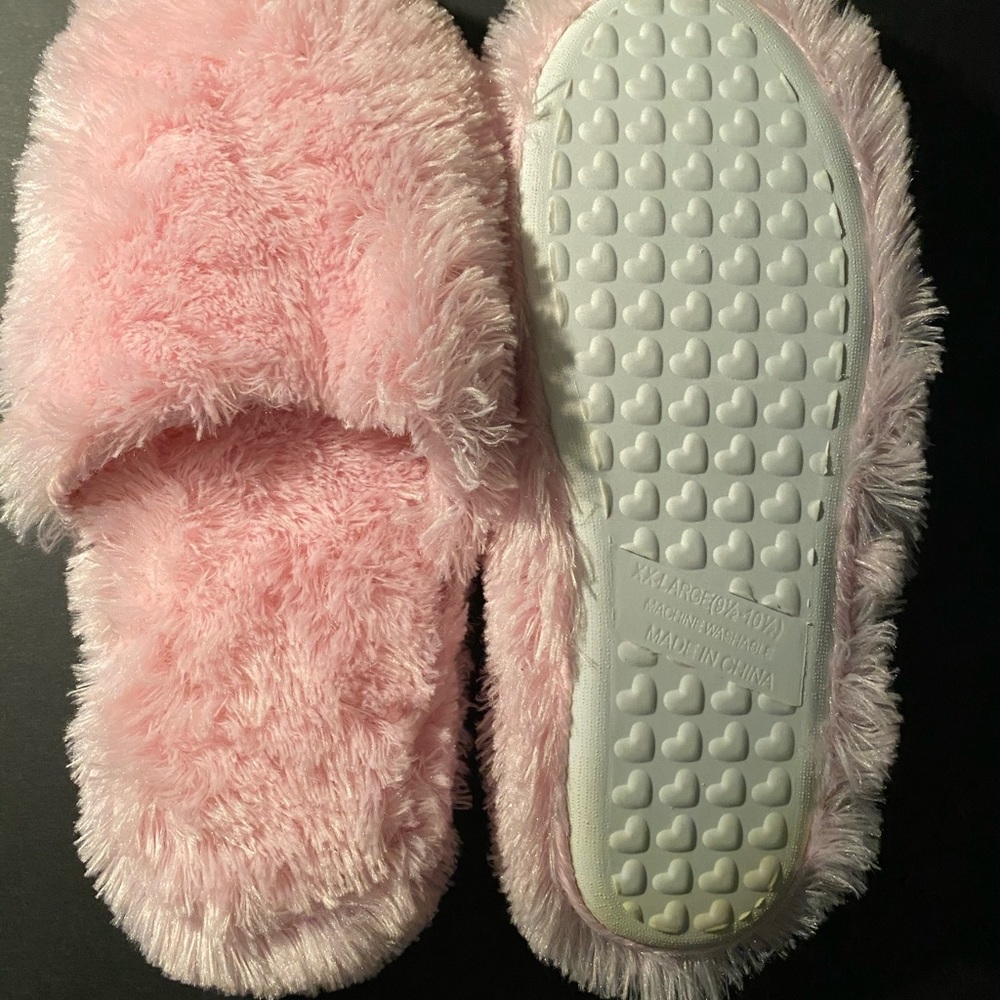 Pink fuzzy slippers
